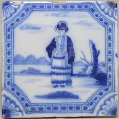 Liverpool delft tile painted in blue with a woman, circa 1760