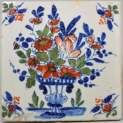 London delft tile painted in blue, red and green, circa 1730