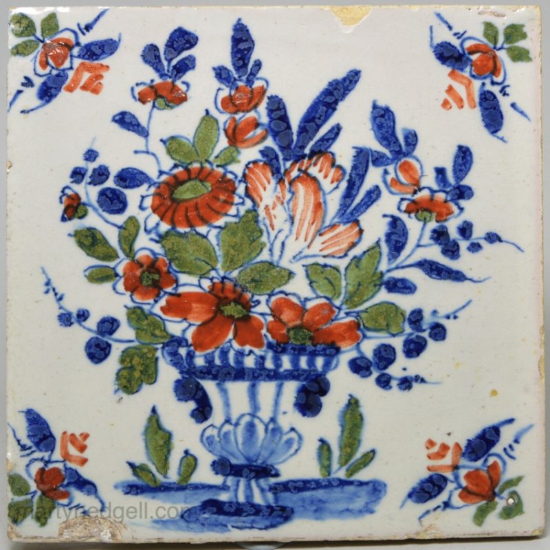 London delft tile painted in blue, red and green, circa 1730