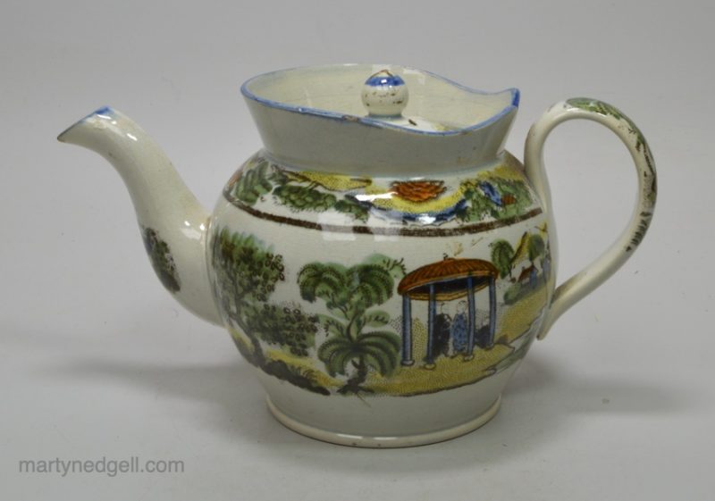 Pearlware pottery teapot decorated with Salopian type prints, circa 1820