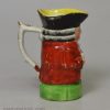 Miniature pearlware pottery Toby jug decorated with enamels over the glaze, circa 1820