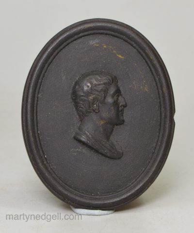 Small black basalt plaque of a Roman, circa 1790