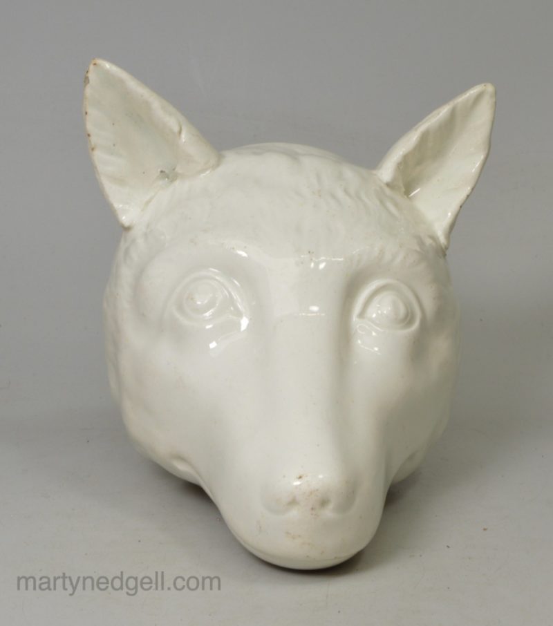 Pearlware pottery fox head stirrup cup, circa 1820