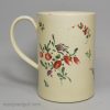 Creamware pottery tankard, decorated with floral enamels over the glaze, circa 1780