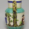 Pearlware pottery jug moulded with the Vicar, Sexton and Clerk decorated with colours over the glaze, circa 1810