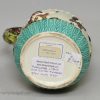 Pearlware pottery jug moulded with the Vicar, Sexton and Clerk decorated with colours over the glaze, circa 1810
