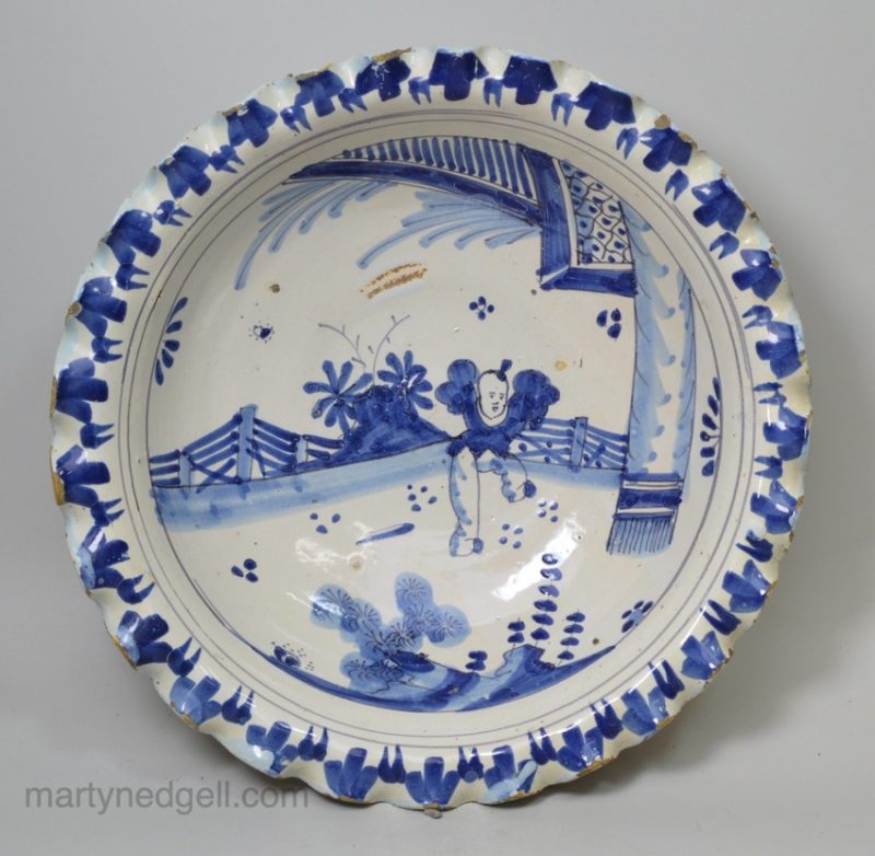 Brislington delft shallow bowl decorated with jumping boy, circa 1690
