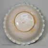 Brislington delft shallow bowl decorated with jumping boy, circa 1690