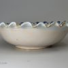 Brislington delft shallow bowl decorated with jumping boy, circa 1690