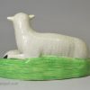 Creamware pottery model of a ewe and lamb decorated under the glaze, circa 1800