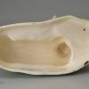 Creamware pottery model of a ewe and lamb decorated under the glaze, circa 1800