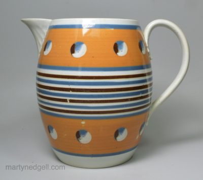 Mochaware pearlware pottery jug with cat's eye decoration, circa 1820
