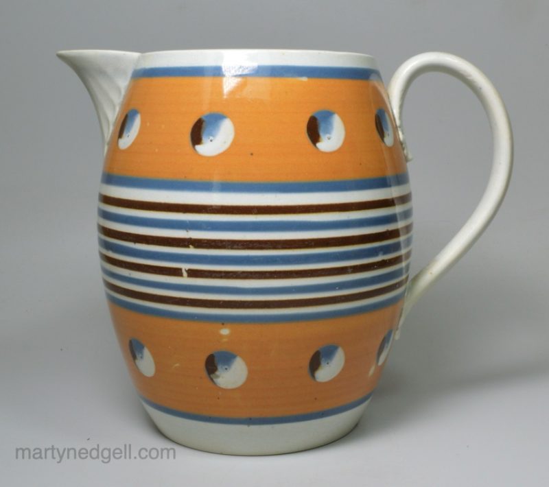 Mochaware pearlware pottery jug with cat's eye decoration, circa 1820