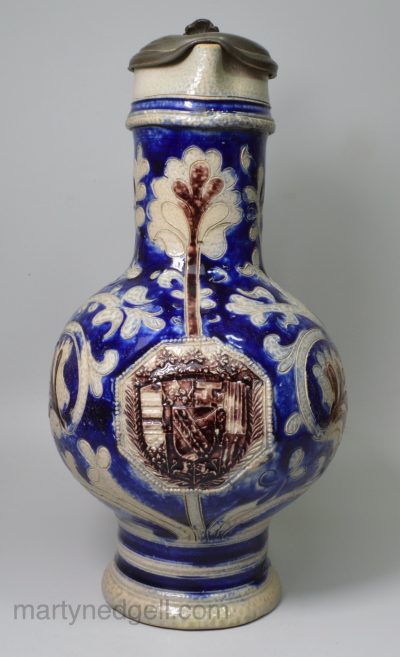Westerwald saltglaze stoneware armorial jug dated 1700