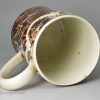Mochaware pearlware pottery mug decorated with combed slip, circa 1790