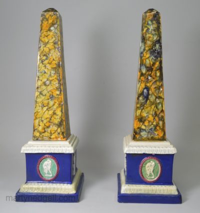 Pair of pearlware obelisks decorated with overglaze enamels, circa 1800, possibly Enoch Wood Pottery, Staffordshire