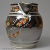 Small pearlware pottery jug decorated with silver lustre resist and enamels, circa 1820