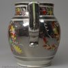 Small pearlware pottery jug decorated with silver lustre resist and enamels, circa 1820