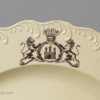 Wedgwood creamware plate printed with a watermill scene below an armorial, circa 1775