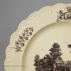 Wedgwood creamware plate printed with a watermill scene below an armorial, circa 1775