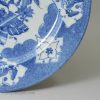 Bristol delft plate decorated in blue with a Qilin and powder blue ground, circa 1740