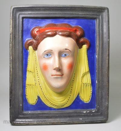 Pearlware pottery plaque moulded as a roman lady, circa 1820