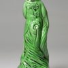 Creamware gren glazed pottery figure of a bacchanalian boy, circa 1790