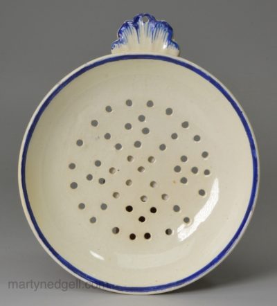 Creamware pottery strainer, circa 1800