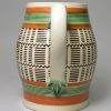 Mochaware jug decorated with inlayed slip on a pearlware pottery body, circa 1820