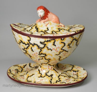 Pearlware pottery sauce tureen with a lion finial, circa 1820, possibly Davenport