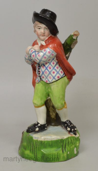 Staffordshire pearlware pottery figure of Winter, circa 1820