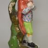 Staffordshire pearlware pottery figure of Winter, circa 1820