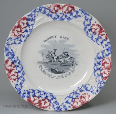 Pearlware pottery child's plate decorated with the print 'DONKEY RACE' and moulded and sponged border, circa 1830