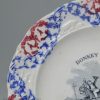 Pearlware pottery child's plate decorated with the print 'DONKEY RACE' and moulded and sponged border, circa 1830