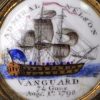 Commemorative Bilston enamel cloak pin 'ADMIRAL NELSON and the ship VANGARD', dated August 17th 1798