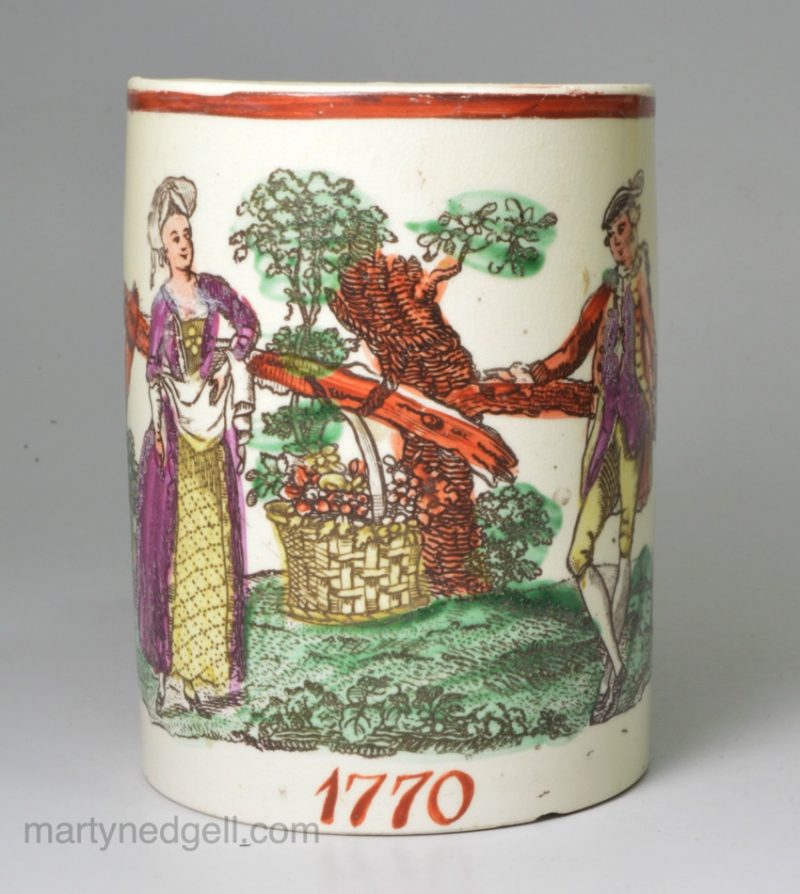 Creamware pottery mug decorated with a coloured print, dated 1770