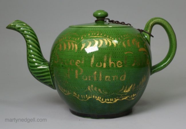 Commemorative creamware teapot with a green glaze 'Duke of Portland' Tory prime minister, circa 1783