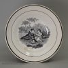 Pearlware pottery toy cup and saucer decorated with a black print under the glaze, circa 1820