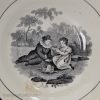 Pearlware pottery toy cup and saucer decorated with a black print under the glaze, circa 1820