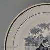 Pearlware pottery toy cup and saucer decorated with a black print under the glaze, circa 1820