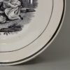 Pearlware pottery toy cup and saucer decorated with a black print under the glaze, circa 1820