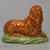 Creamware pottery lion decorated with underglaze colours, circa 1800
