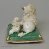 Staffordshire porcelain model of a poodle and pups, circa 1840