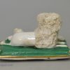 Staffordshire porcelain model of a poodle and pups, circa 1840