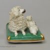 Staffordshire porcelain model of a poodle and pups, circa 1840