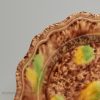 Creamware plate decorated with Whieldon style colours under the glaze, circa 1770