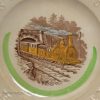Pearlware pottery child's alphabet plate decorated with a print of a steam train, circa 1880