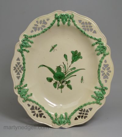 Pierced creamware oval plate with green enamel decoration, circa 1775