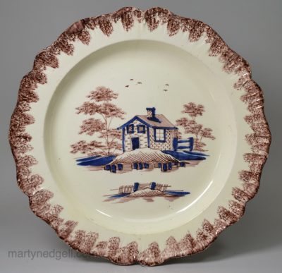 Creamware pottery plate moulded with a shell edge decorated with colours under the glaze, circa 1790