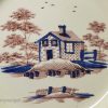 Creamware pottery plate moulded with a shell edge decorated with colours under the glaze, circa 1790